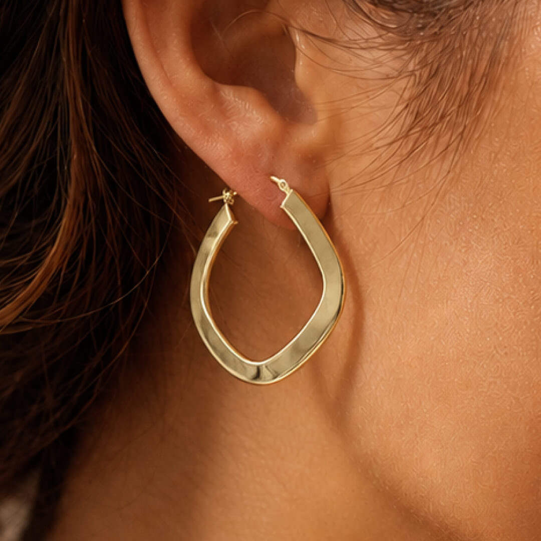 Star Jewellers Twisted Hexagon 14ct Gold Plated Hoops worn on the ear