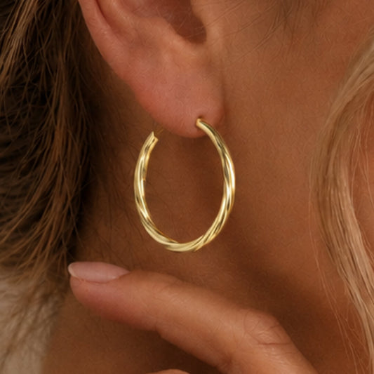 Star Jewellers Twisted Hoop Earrings in 14ct gold plating worn on the ear