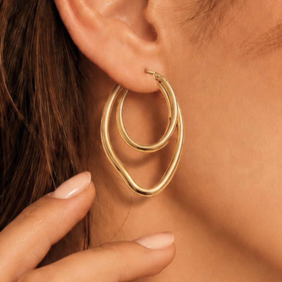 Star Jewellers Twisted Paper Clips Gold Plated Earrings worn on the ear